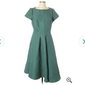 Flouncy midi a-line quilted forest green dress